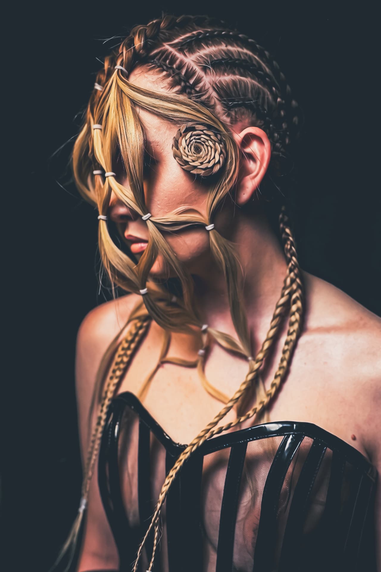 Side profile of a braided hair creation