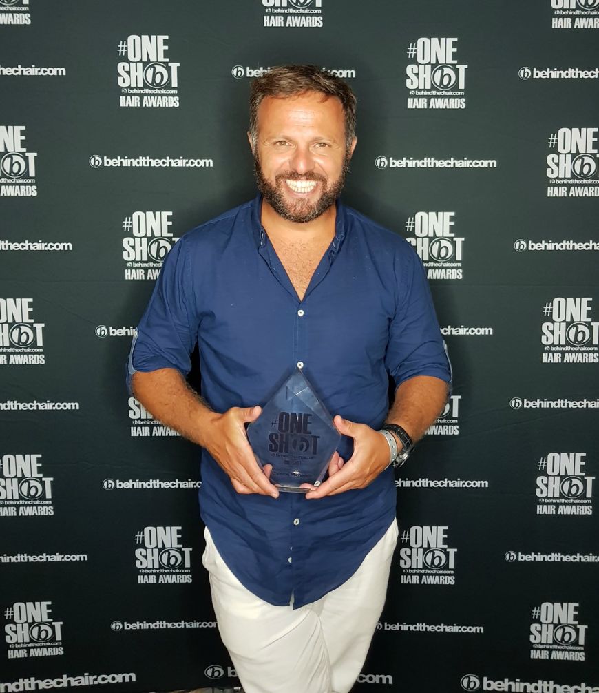 Christos Michailidis at a professional hairdressing awards ceremony